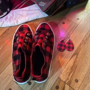 Blowfish Malibu slip on fringed sneakers.